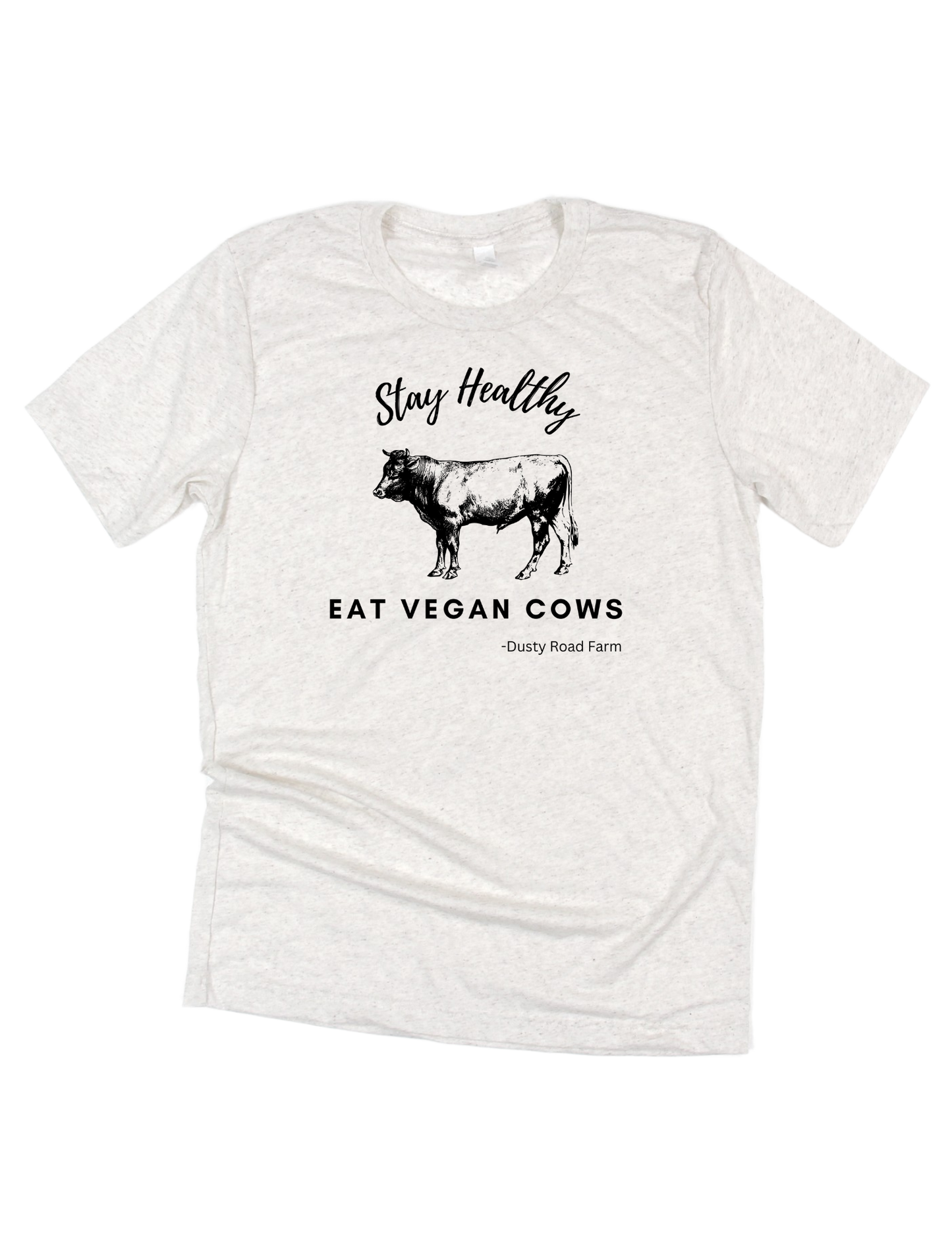 White t-shirt with black text and cow illustration on a white background