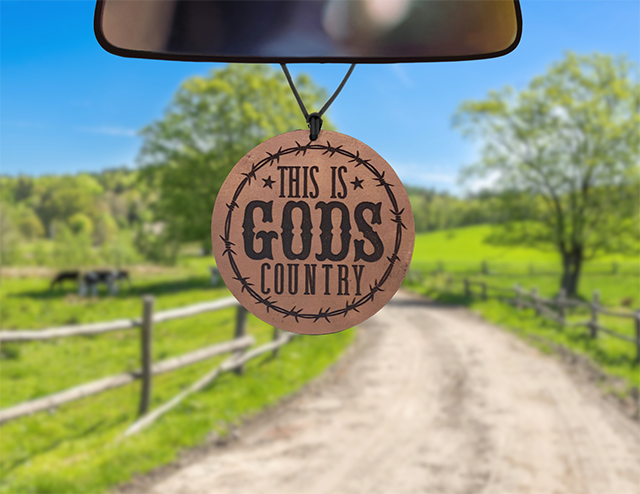 Leather Car Freshener on dirt road