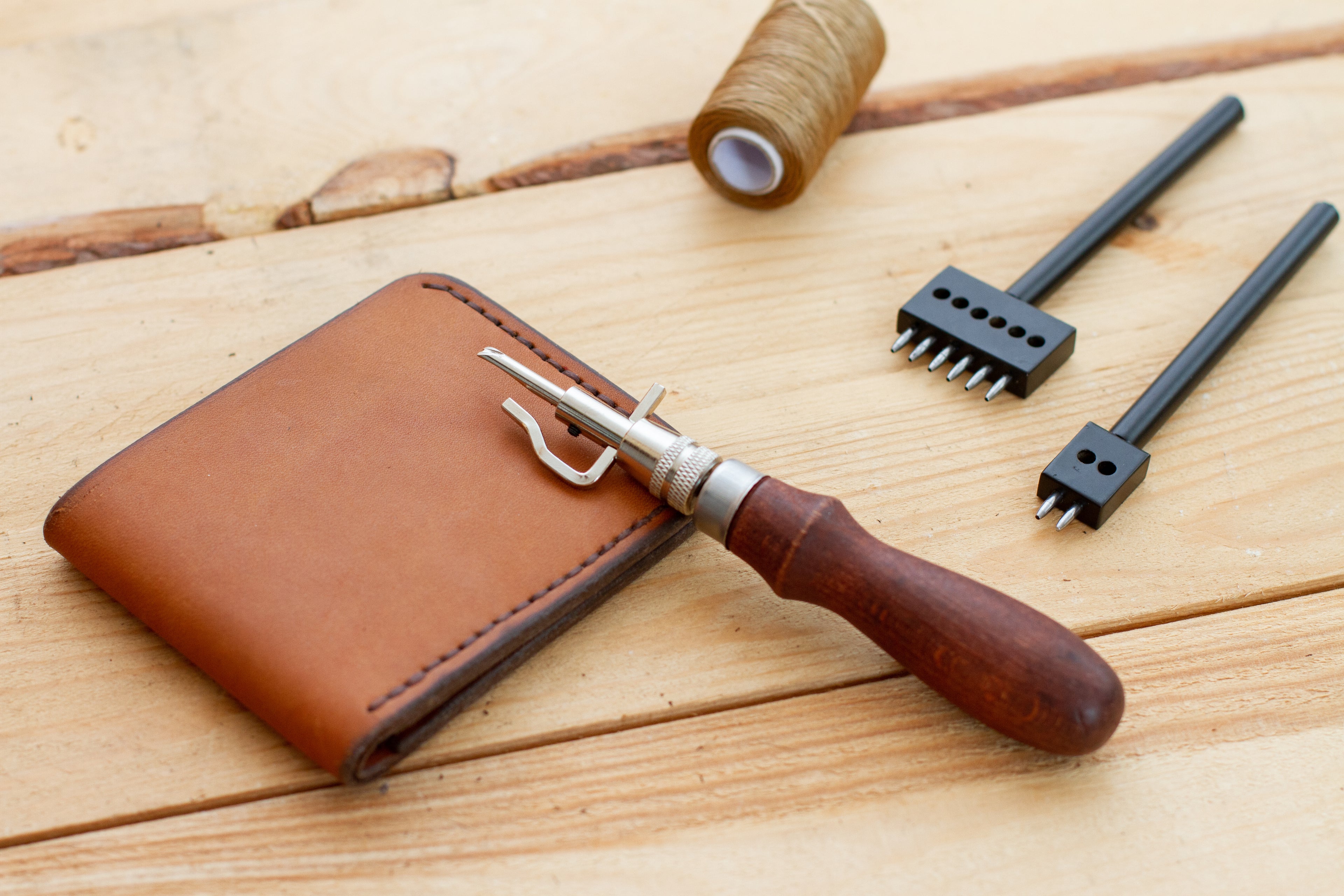 Leather tools on a wooden table