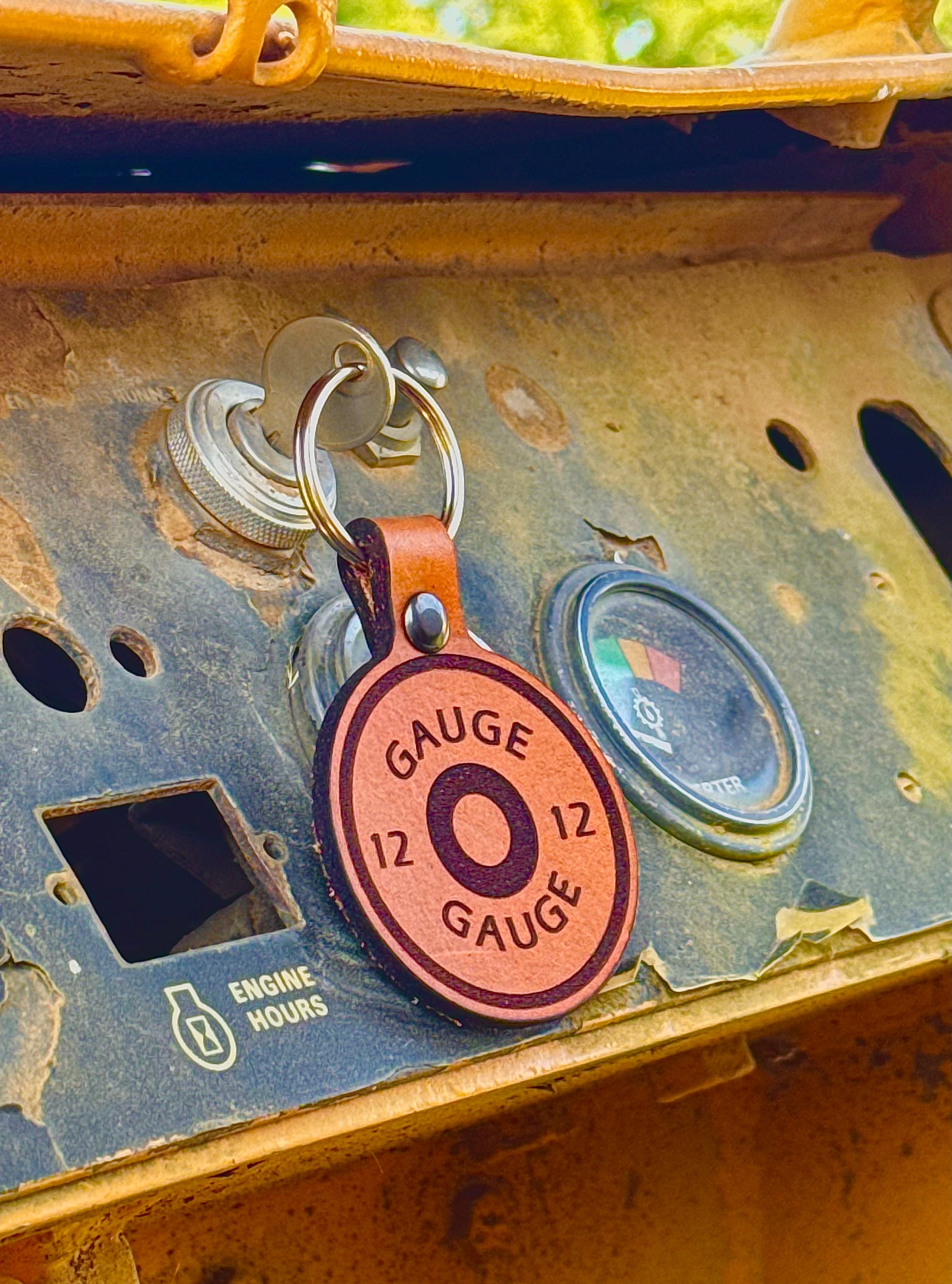 12 guage shotgun shell on a leather keychain by veteran owned dusty road farm