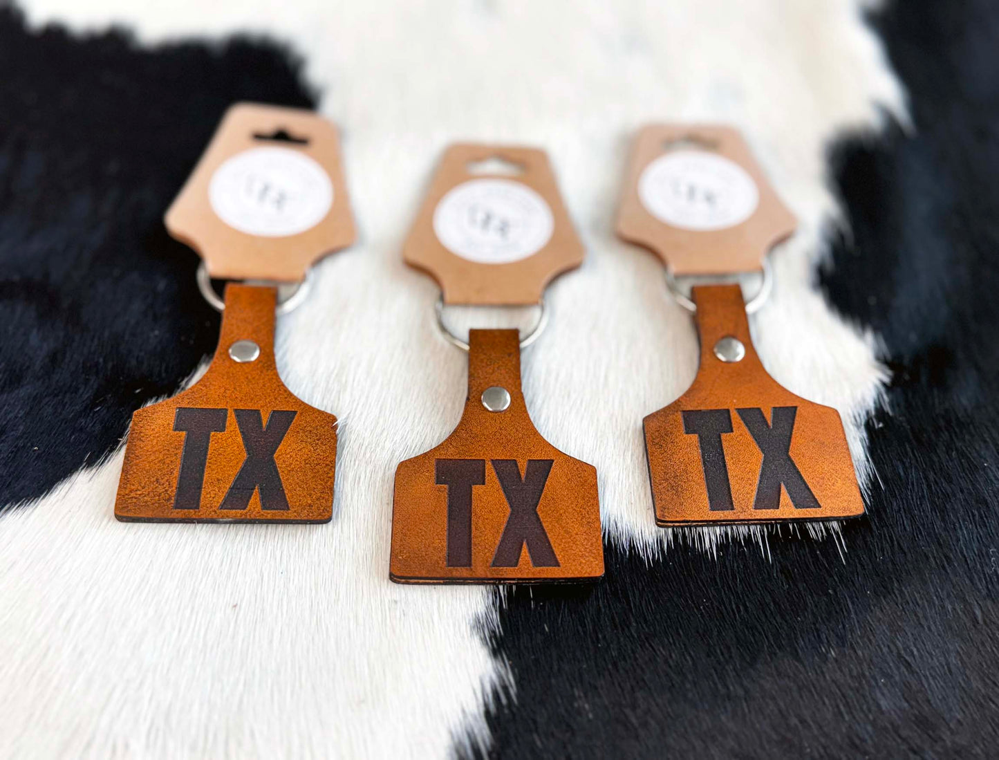 Leather keychains on cowhide
