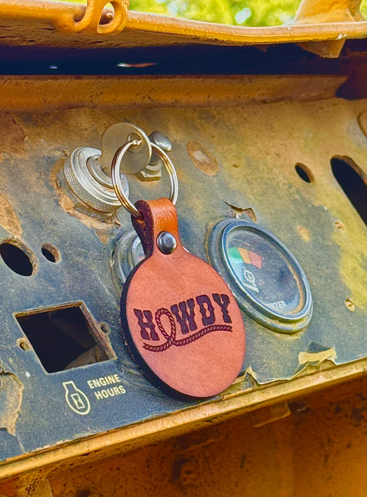 Leather keychain with 'HOWDY' engraving made in Texas by Dusty Road Farm